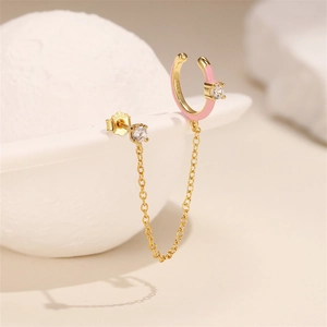 Detail of pink enamel chain ear cuff with S925 silver stamp and sparkling zircon stone
