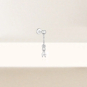 Detailed macro view of S925 sterling silver earring featuring tiny marquise-cut zircons