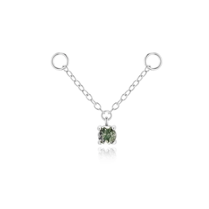 Macro detail of S925 sterling silver chain with a green rutilated quartz stone pendant