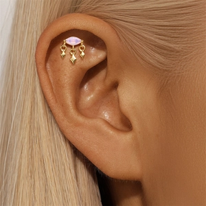 Detailed view of pink marquise opal stud earring with gold-plated fringe charms