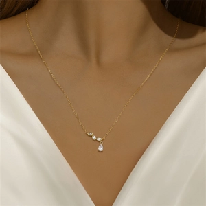 Close-up of S925 silver necklace with sparkling marquise and teardrop crystal pendant