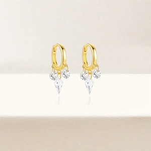 Detailed shot of S925 silver fan-shaped hoop earrings with sparkling zircon pendants