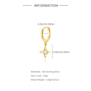 Macro view of S925 sterling silver hoop earrings with star-shaped opal pendant charms