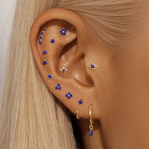 Detailed set of gold plated S925 silver hoop earrings with marquise lapis lazuli stones