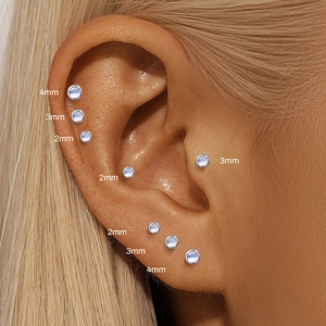 S925 sterling silver moonstone stud earrings in 2mm 3mm and 4mm sizes on ear