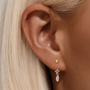 Detailed view of s925 silver ear studs with marquise labradorite and purple zircon gems