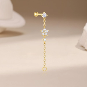 Detailed shot of S925 silver gold-plated dangling stud with opal flower and zircon