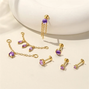 Detailed view of S925 silver gold-plated labret studs with purple amethyst and chains