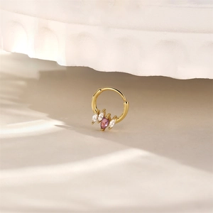 Detail of 18K gold S925 silver hoop with marquise-cut purple amethyst and white zircons