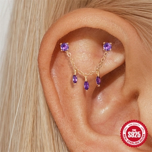 S925 sterling silver chain stud earring with purple crystal on female ear model