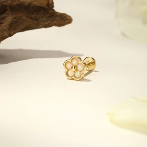 Detail of S925 sterling silver stamp on golden opal flower piercing stud earring
