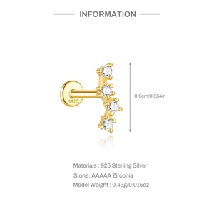 Detail of gold S925 sterling silver curved earring with AAAAA zirconia stones