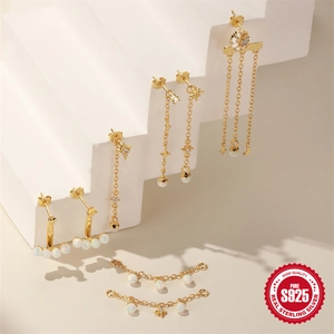 Elegant S925 sterling silver star moon earrings with opal tassels on white podiums