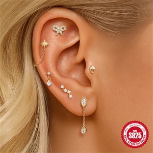 S925 sterling silver bowknot opal ear stud set with gold plating on female model