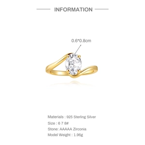 Detail view of gold-plated S925 silver bypass ring with 0.6x0.8cm oval cubic zirconia
