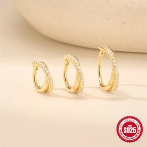 Three sizes of 925 sterling silver gold-plated crisscross hoop earrings with white zircons