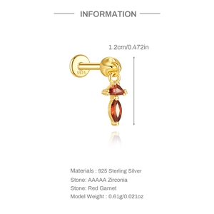 Macro detail of S925 sterling silver ear stud with red garnet and flat back screw design