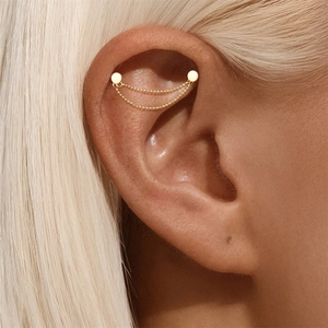 Detail of gold S925 sterling silver double bead chain piercing for cartilage ear