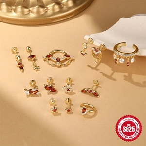 S925 sterling silver gold earrings set with red garnet stones and geometric designs