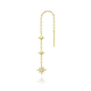 Dettaglio orecchini a nappa S925 con stella in argento dorato e accenti di cristallo