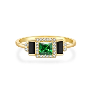 Gold ring featuring a square green gemstone and black side stones in a symmetrical design