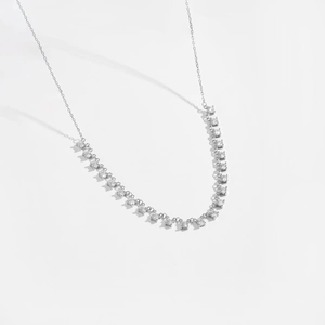 Detailed close-up of S925 silver necklace with micro-pave white zircon stones