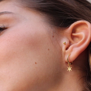 Elegant gold S925 sterling silver hoop earrings with star charms and zircon studs