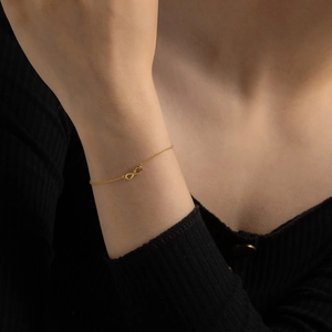 Minimalist gold infinity symbol bracelet with adjustable fine chain for women