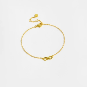 Macro detail of gold infinity charm bracelet showing S925 hallmark and lobster clasp