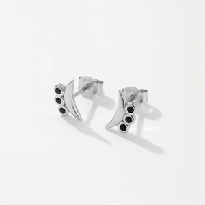 Macro shot of S925 sterling silver stamp on crescent studs with three round black stones
