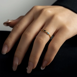Minimalist S925 sterling silver ring with five colorful zircons on a gold-plated band