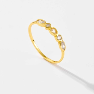 Elegant gold S925 silver ring featuring five multi-shape cubic zirconia stones