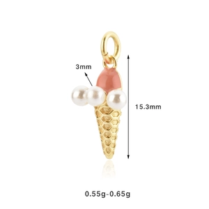 Macro detail of S925 silver ice cream pendant with golden cone and white pearls
