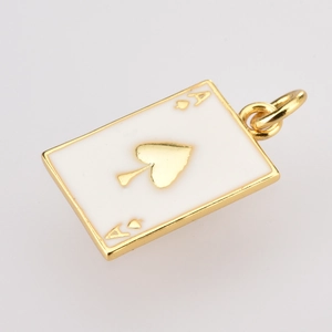 Detailed view of an Ace of Spades poker pendant with gold plating and white enamel finish