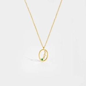Macro shot of gold-plated S925 silver necklace with multicolored zircon constellation stones