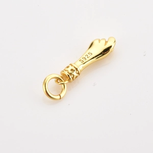 Macro shot of S925 sterling silver insect charm with gold plating and S925 hallmark