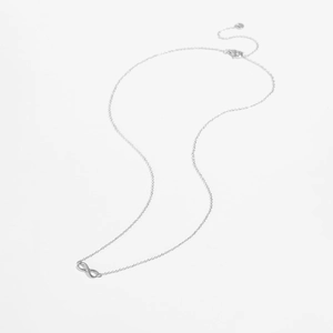 Macro shot of S925 sterling silver infinity pendant with lobster clasp and extension chain