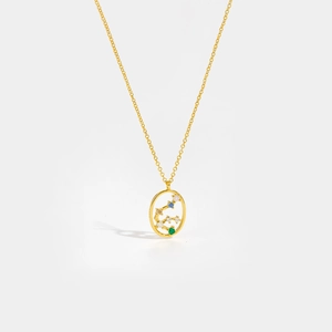 Detail of S925 sterling silver gold necklace featuring a colorful zodiac sign pendant