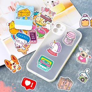 DIY colorful cartoon stickers showing usage on a clear phone case with pet patterns