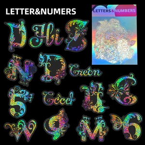 Detail of holographic alphabet and number stickers with sparkling laser finish effects