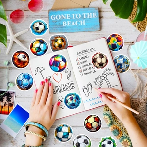 Waterproof soccer stickers with various creative artistic patterns on a beach theme desk