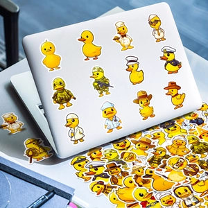 Detailed view of yellow duck career stickers applied to a silver laptop lid