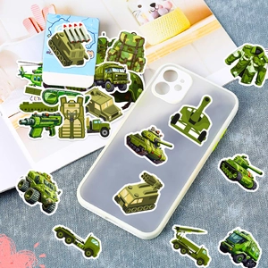 Detail of military cartoon stickers with tanks and helicopters on a phone case and books