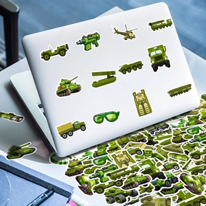 Close-up of military theme stickers featuring tanks and trucks on a laptop cover