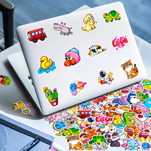 Mix of 50 cartoon stickers shown applied on a laptop surface for DIY decoration