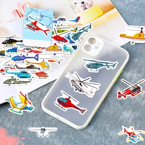 Cartoon helicopter stickers applied to a clear phone case with vibrant rescue aircraft designs
