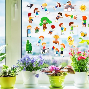 Close-up of colorful cartoon musical instrument jelly stickers on a bright glass window