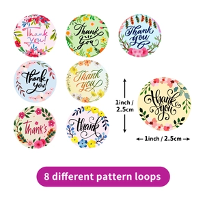 Roll of 1 inch floral Thank You stickers with eight elegant botanical designs for packaging
