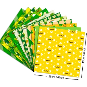12 sheets of St. Patrick's Day decorative paper with clovers and gold coins patterns