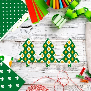 Detail of Christmas tree shaped paper crafts with green geometric diamond patterns